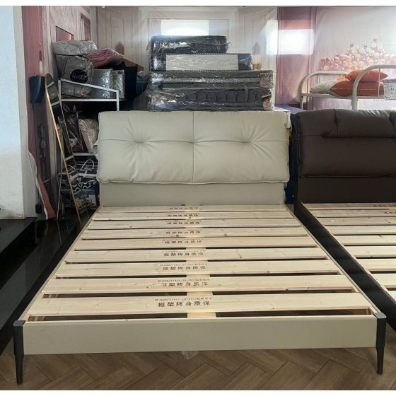 Pine wood and cowhide bed