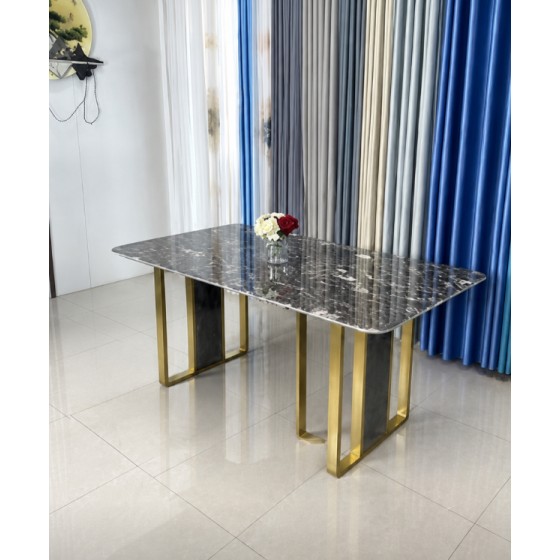 Black marble table with gold legs